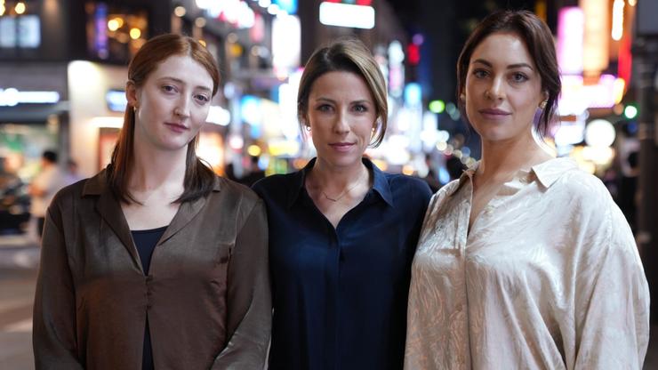 Sarah Greenhalgh with Liz and Amy, two Australian women enticed by the cult Providence.