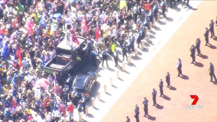 Thousands have gathered out the front of Parliament House in Canberra to protest vaccine mandates in Australia.